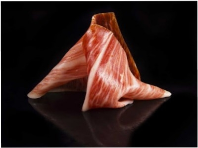 What is the white marbling of Iberian ham?